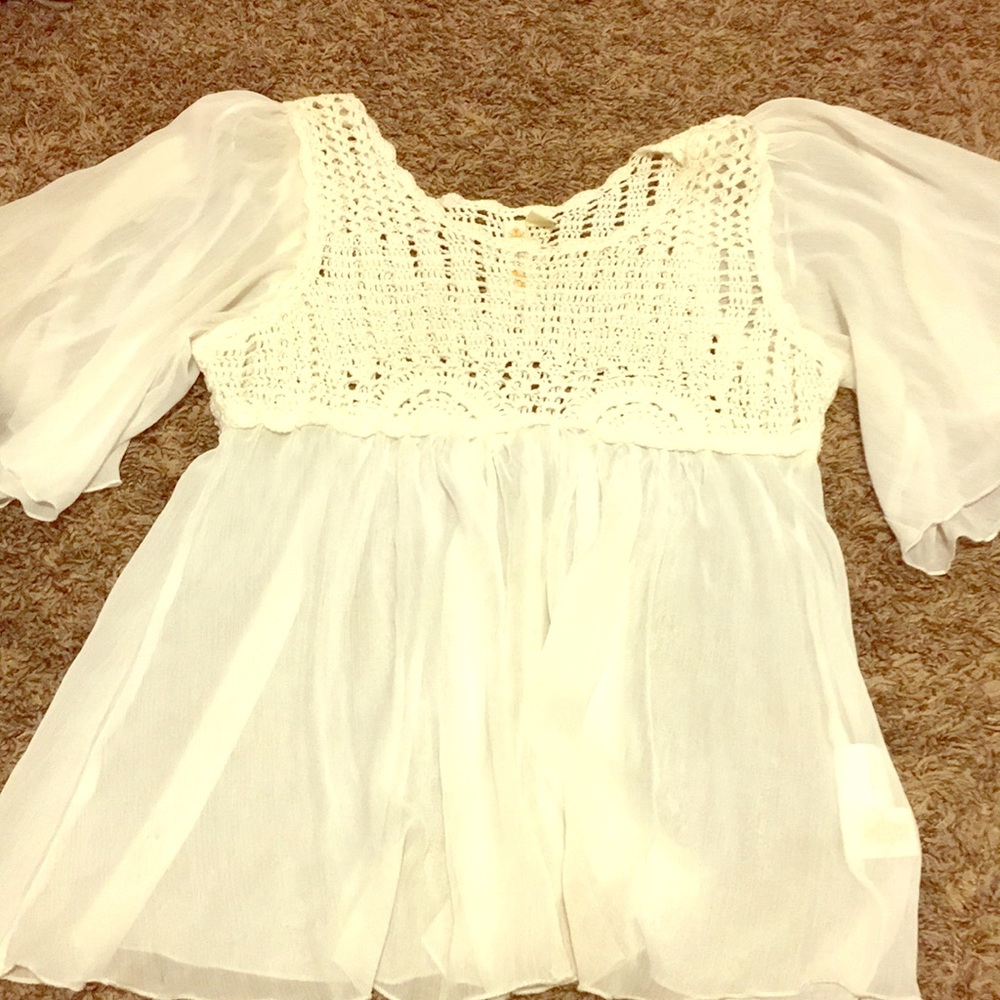 White flowy top